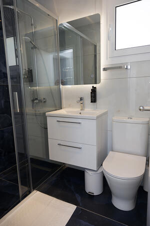 First-floor modern family bathroom with essential amenities at Yellow16.