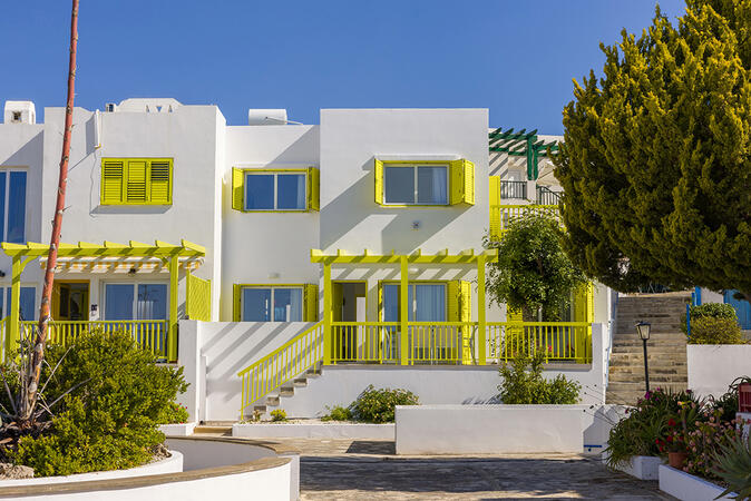 Yellow16 Holiday Apartment exterior at Ikaria Village, Paphos.