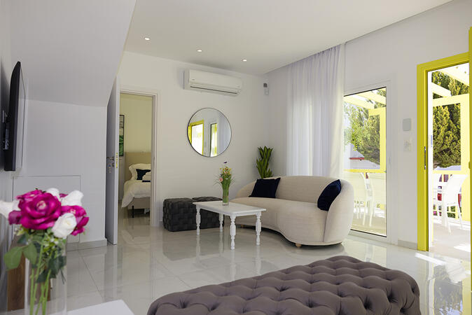 Modern living space with Mediterranean-style décor at Yellow16.
